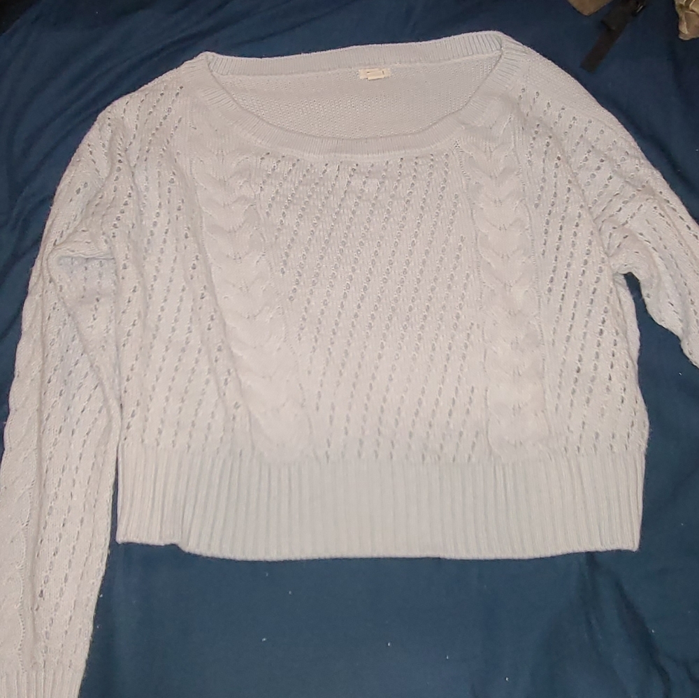 GARAGE CLOTHING blue sweater size small.